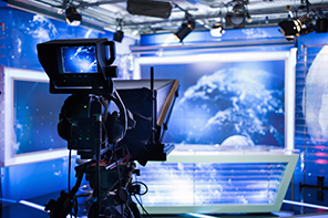 Video camera - recording show in TV studio - focus on camera